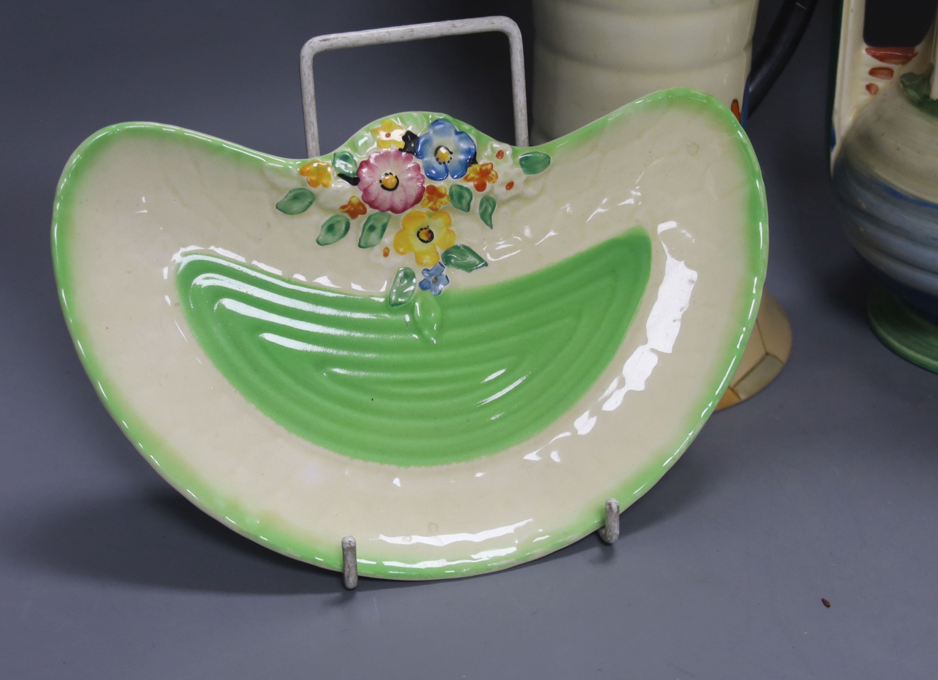 An Art Deco style jug and vase, wall mask and Crown Devon dish